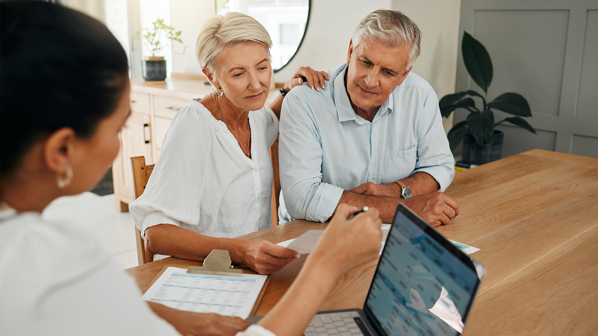 Financial advisor consultation with clients on retirement