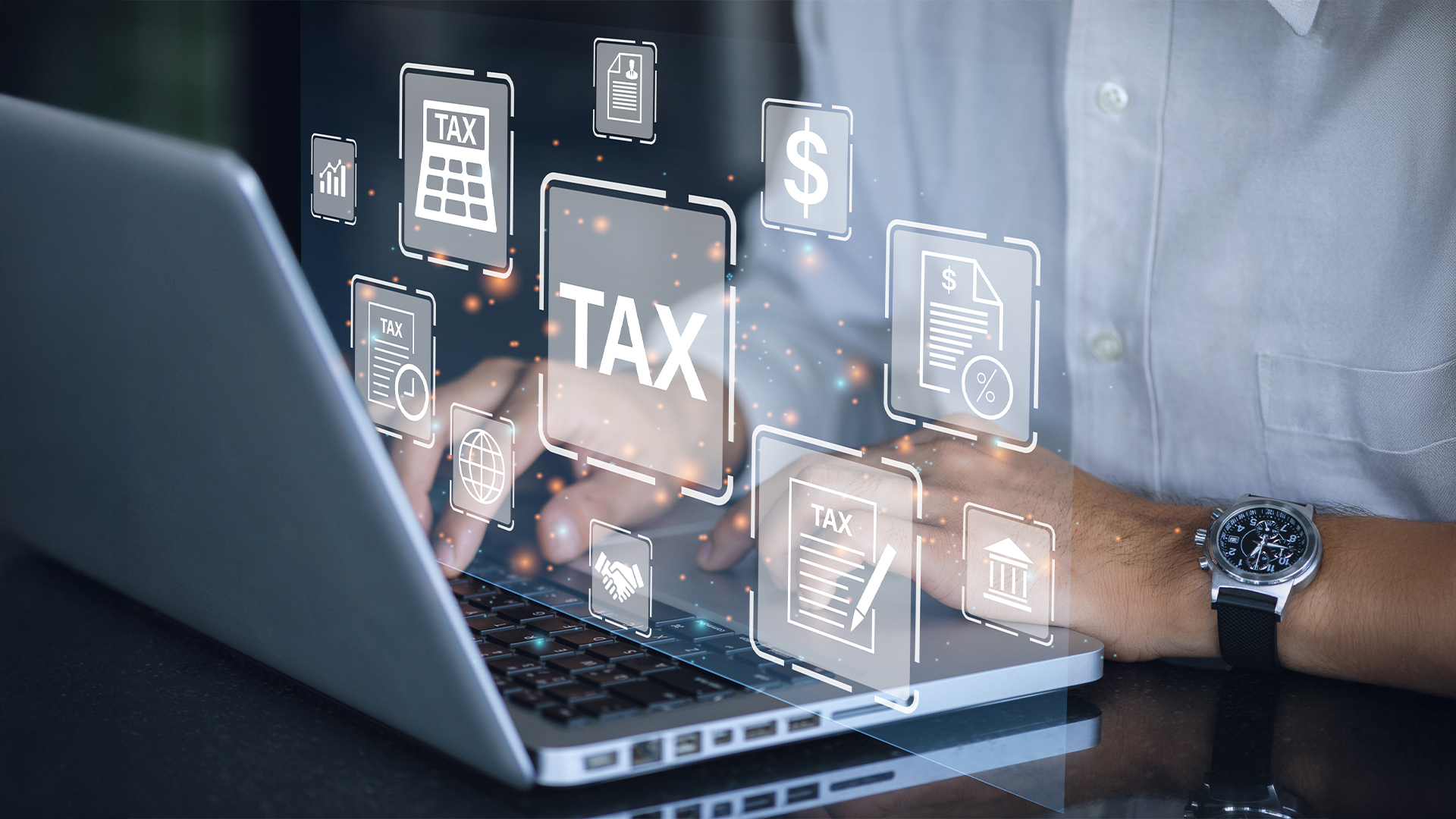 Busines using a computer to complete Individual income tax return form online for tax payment.