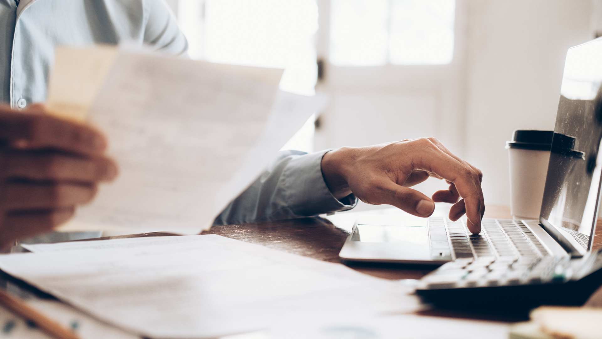 Male accountant or banker use calculator.